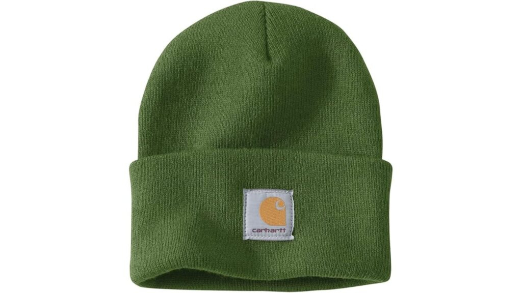 "Close-up view of a Carhartt Men's Knit Cuffed Beanie in a solid color, showcasing its soft, knitted texture and durable design. The beanie features the Carhartt logo stitched on the front, emphasizing its rugged yet stylish look."